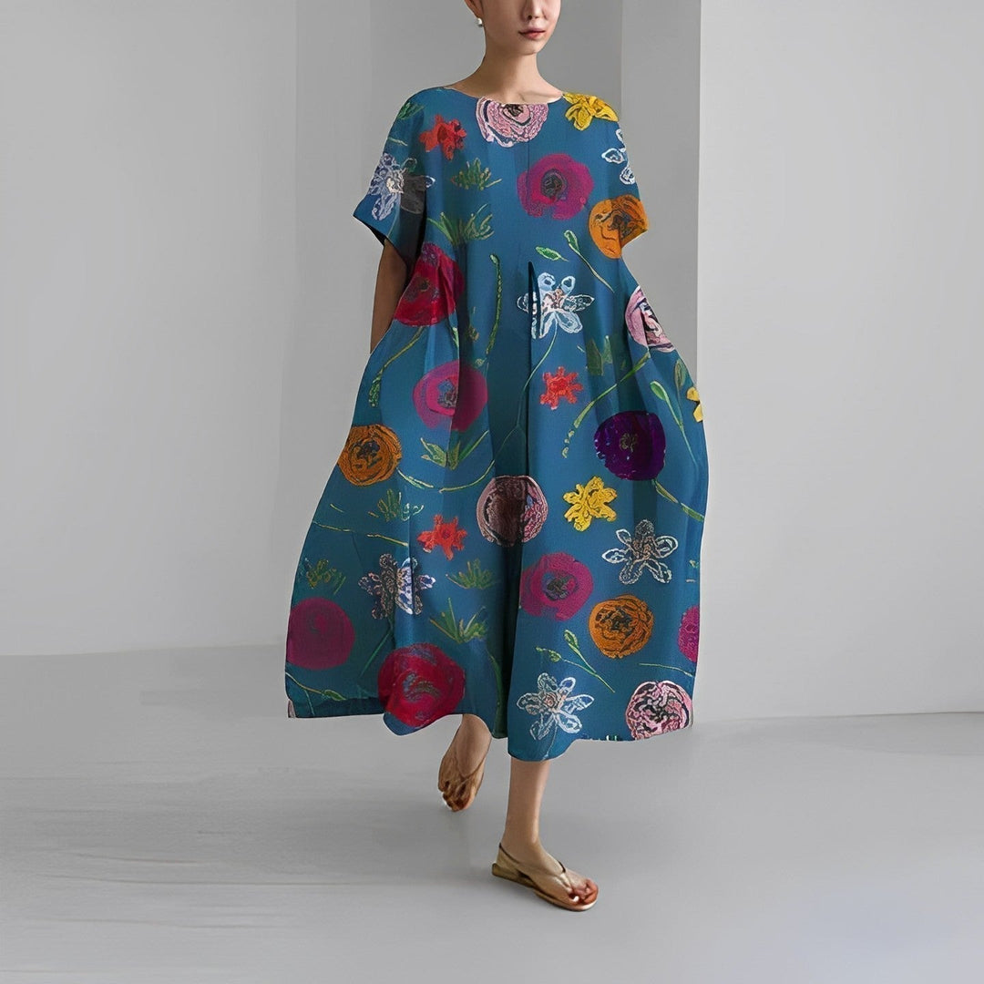 Artistic women's floral maxi dress with a vibrant, eye-catching print, comfortable for chic summer fashion.