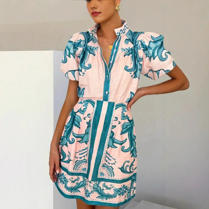 Stylish floral puff sleeve cocktail dress for women, elegant party wear.