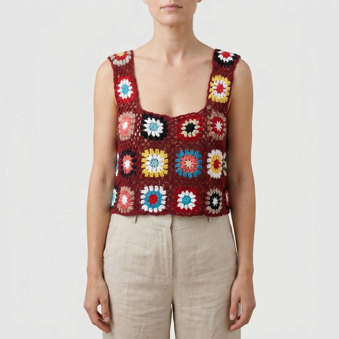 Stylish lightweight women's sleeveless crop top with vibrant floral print for summer fashion.