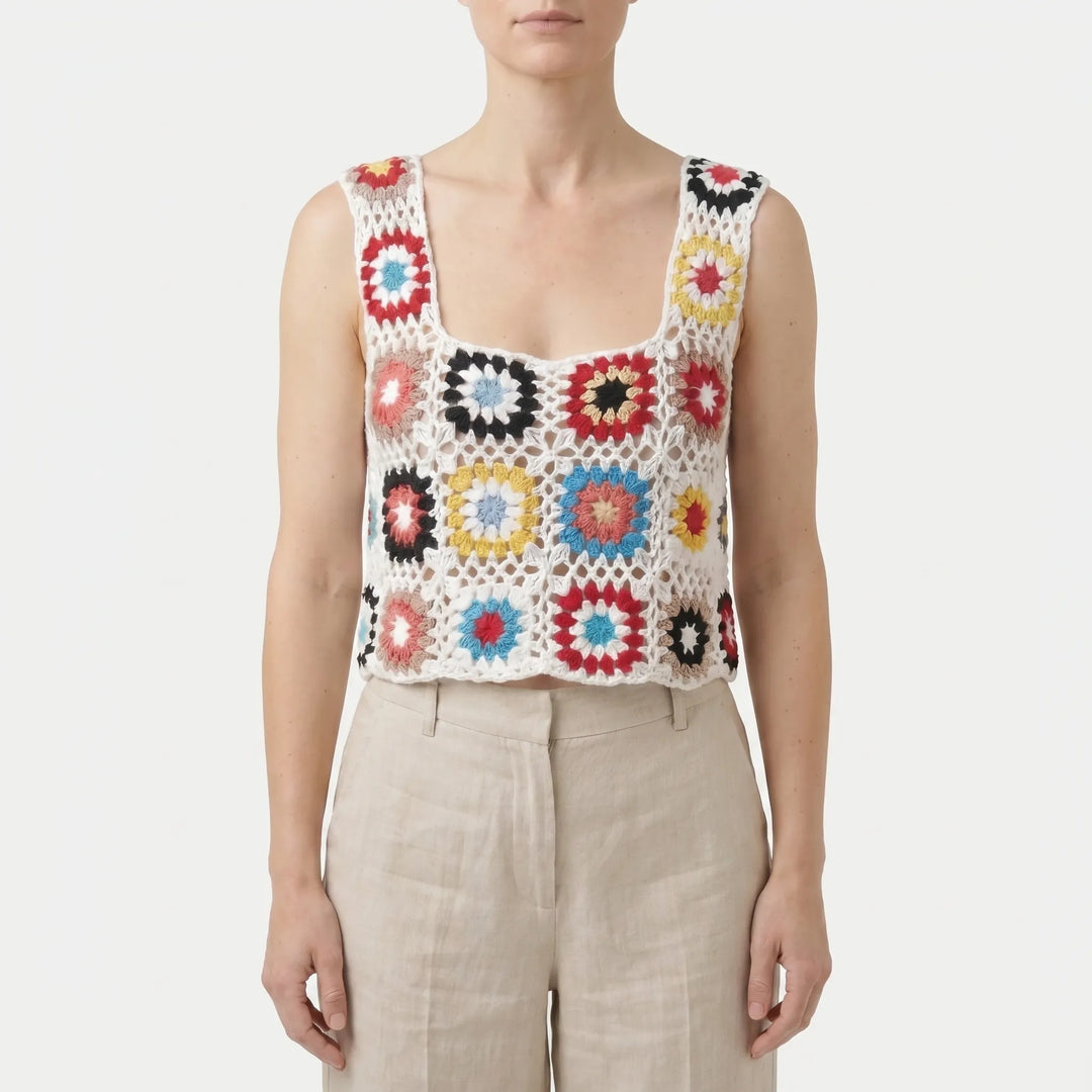 Vibrant floral print women's crop top, sleeveless & lightweight. Great for summer fashion and casual style.