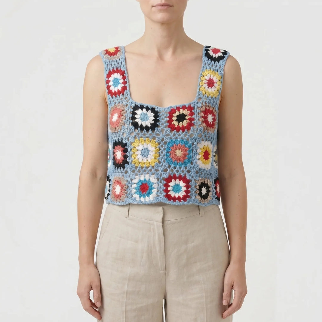 Women's vibrant boho floral crop top. Sleeveless & lightweight, perfect for summer casual fashion or beach.