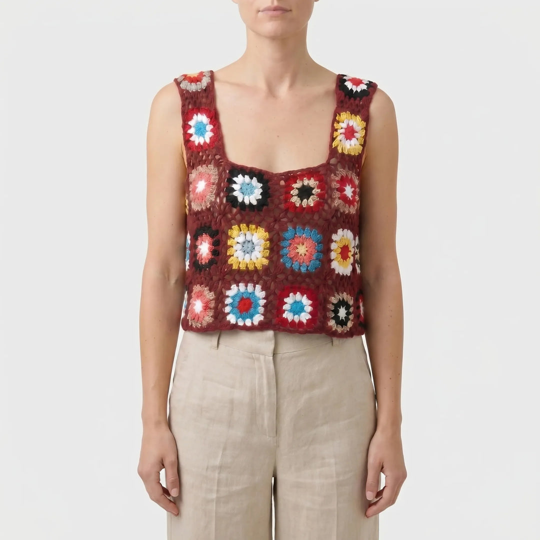 Colorful sleeveless crop top for women, featuring a vibrant floral print. Perfect lightweight summer fashion.