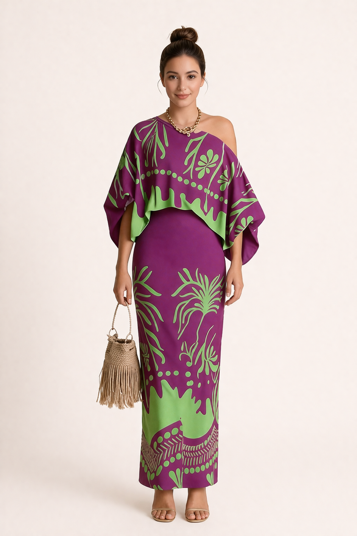 Women's vibrant printed blouse and flowy maxi skirt two-piece set, perfect for summer vacation fashion.
