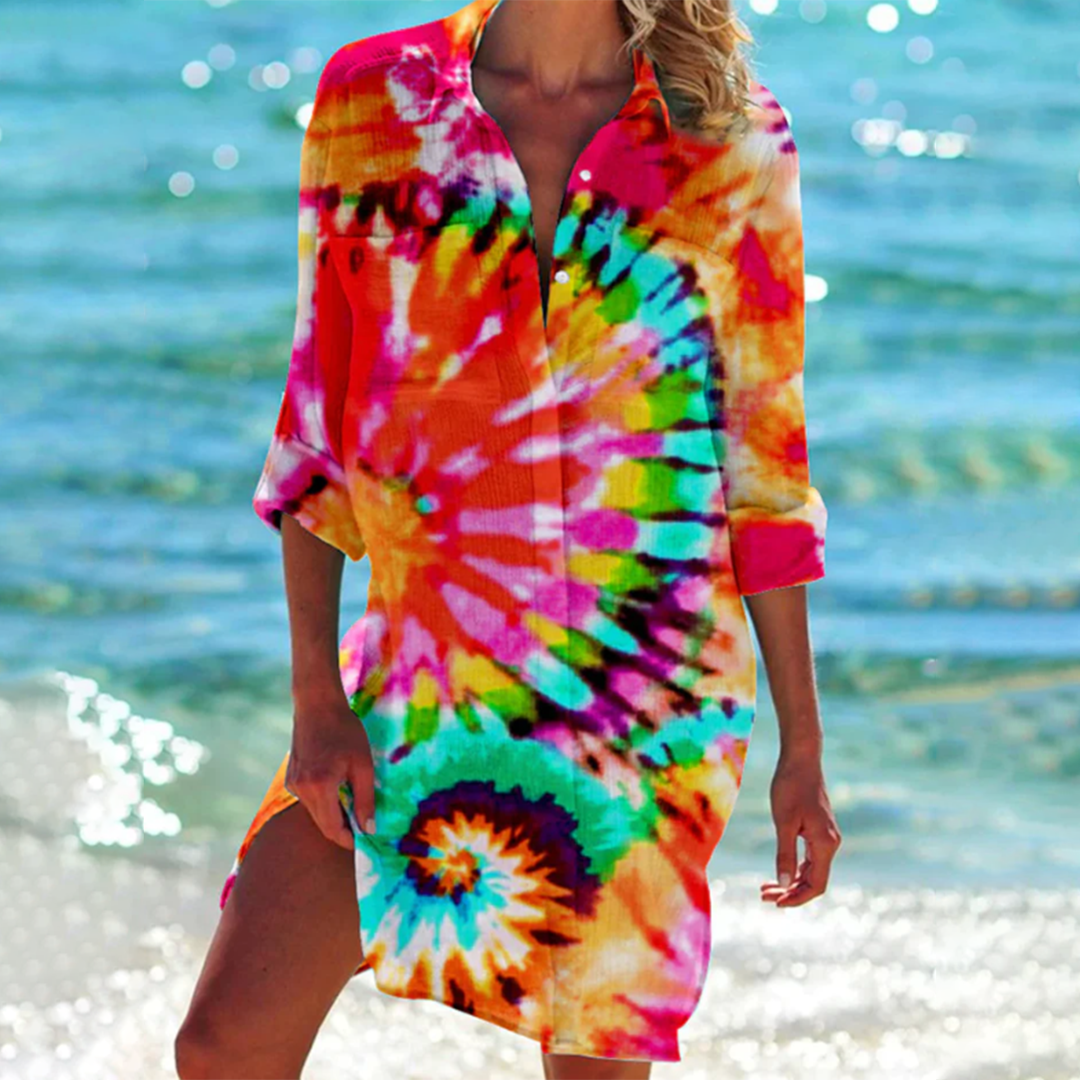 Women's vibrant printed summer shirt. Relaxed fit, A-line cut, with practical pockets. Ideal for beach & vacation.