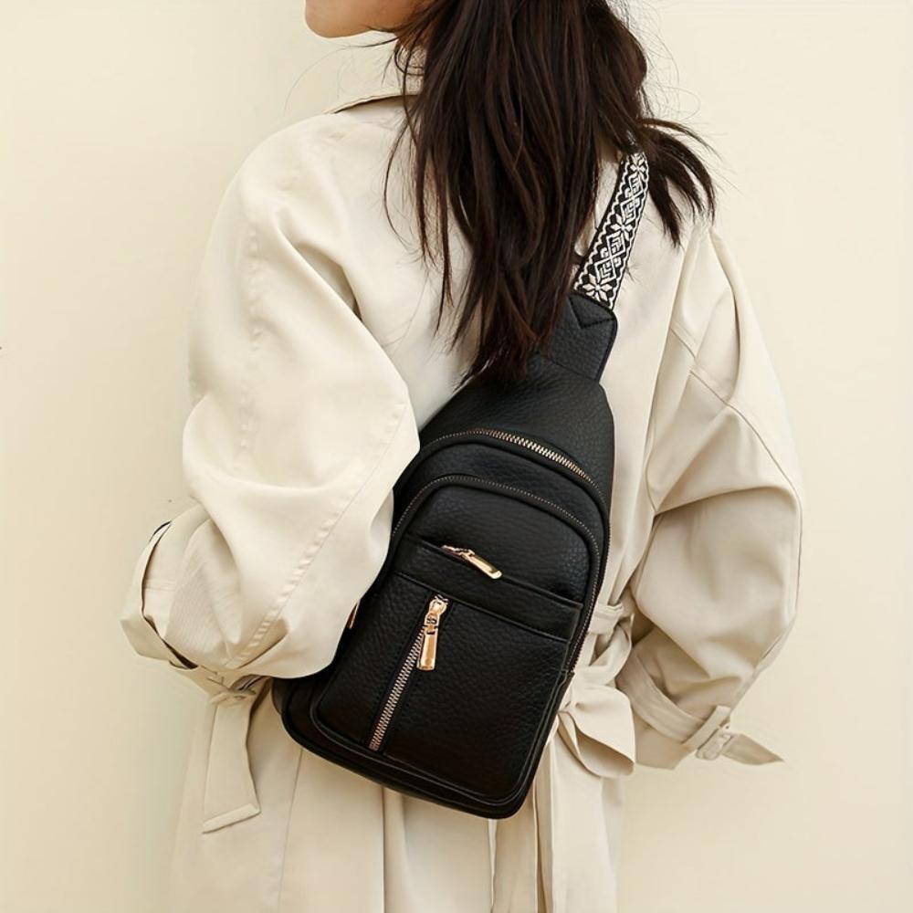 Vintage-inspired black leather crossbody, women's chest bag combining style and function.
