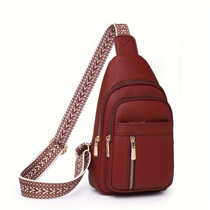 Chic red leather vintage crossbody, women's shoulder bag ideal for stylish functionality.