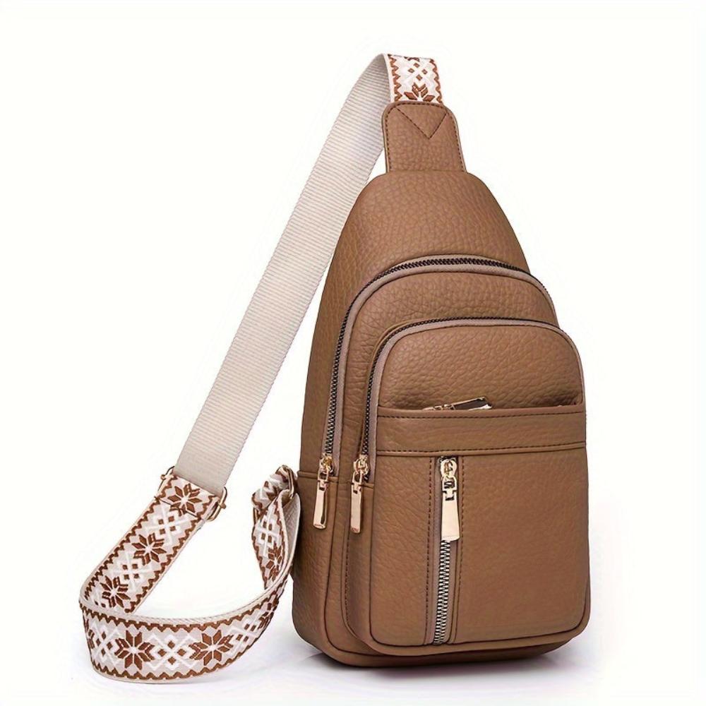 Retro women's red leather shoulder bag, stylish and practical vintage chest bag.