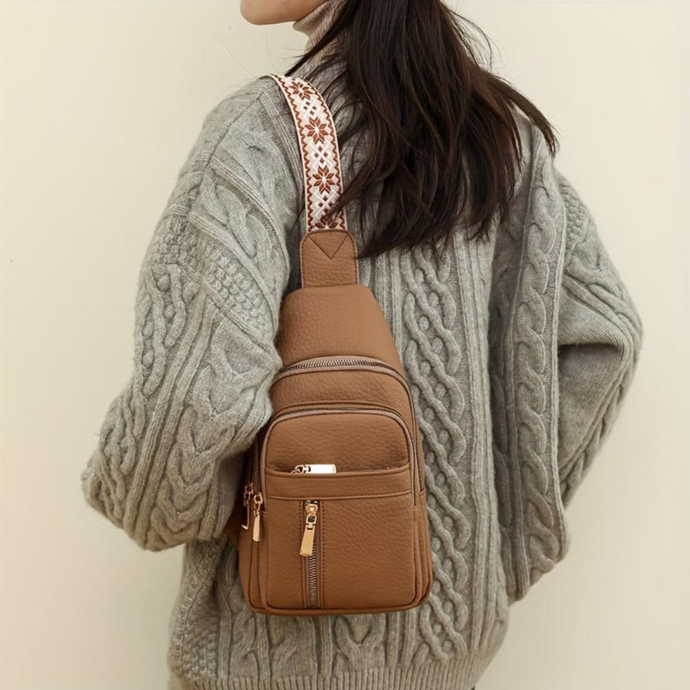 Khaki vintage leather crossbody bag for women, ideal as an everyday chest or shoulder bag.