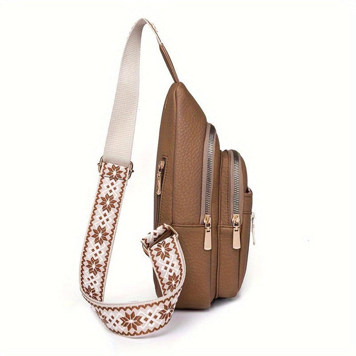 Elegant red vintage leather crossbody bag, a compact women's shoulder bag with retro flair.