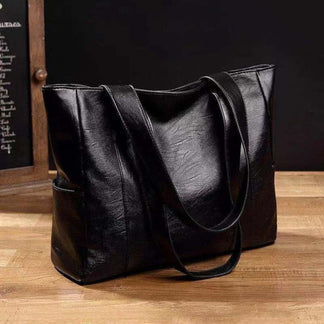 Red vintage women's everyday tote bag. Classic design handbag with shoulder & crossbody straps, a versatile fashion accessory.