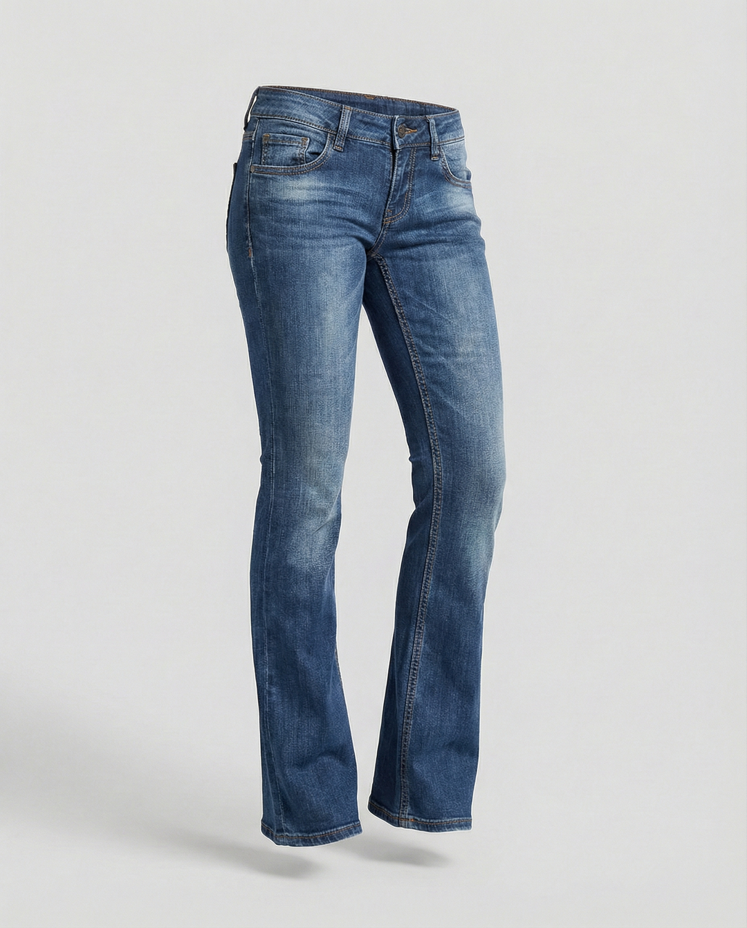 Model showcases women's vintage low-rise flared jeans, highlighting the flattering retro fit.