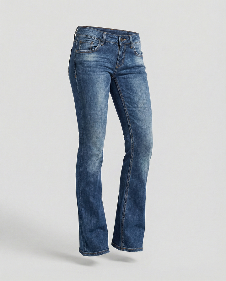 Model showcases women's vintage low-rise flared jeans, highlighting the flattering retro fit.