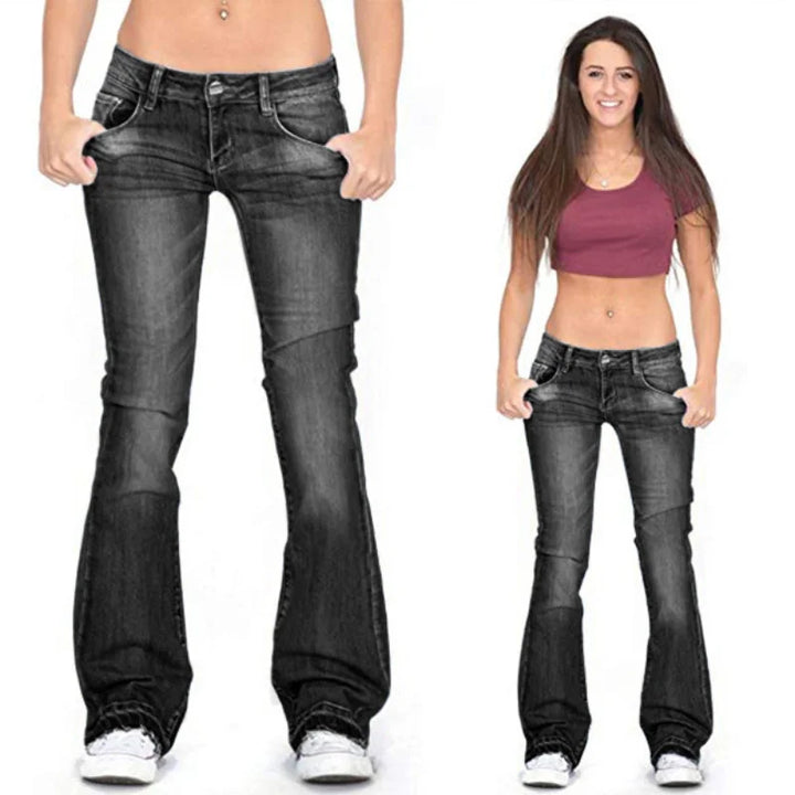 Front view: Women's stylish low-rise flared jeans with classic vintage denim details.
