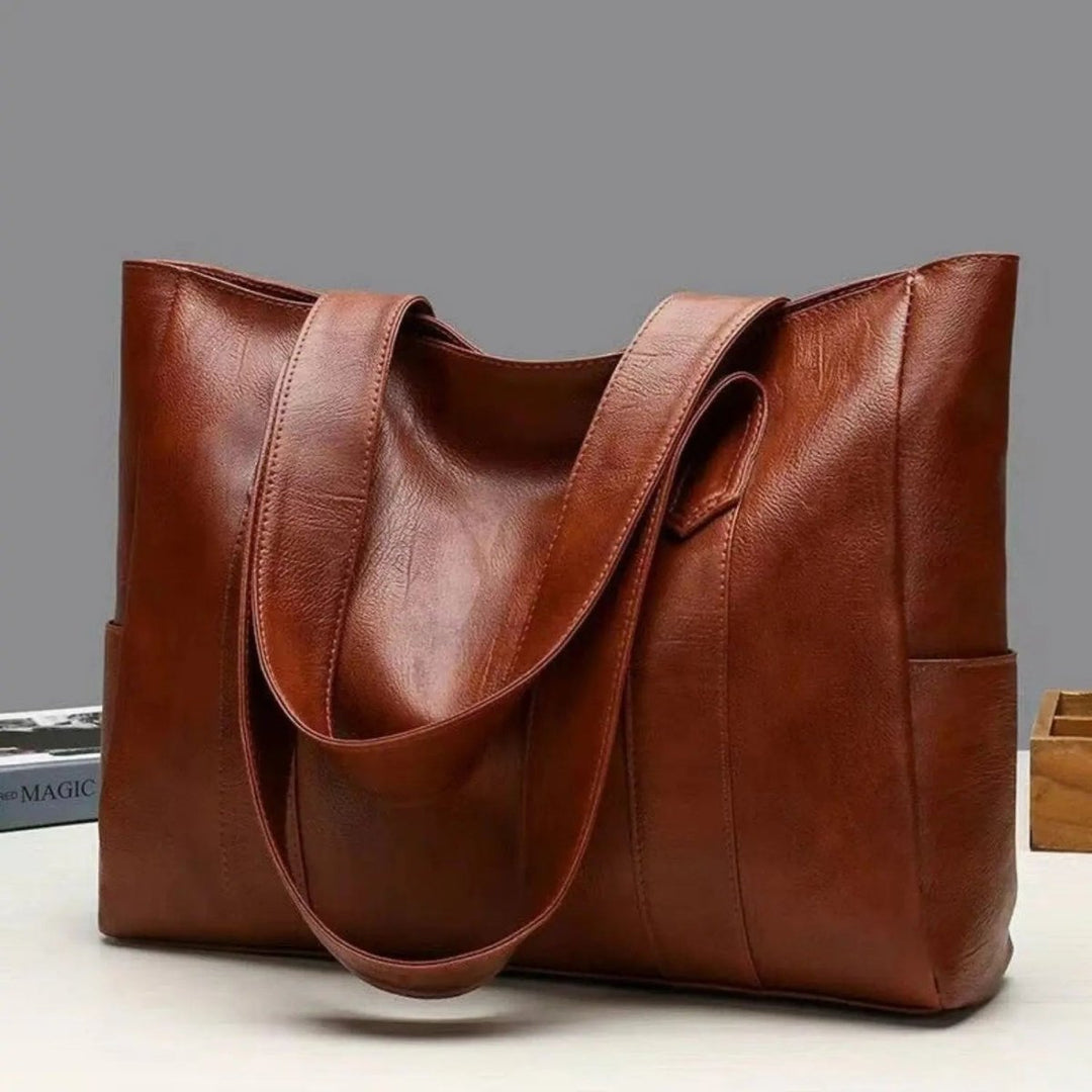 Sophisticated vintage women's tote bag. Classic shoulder handbag, elegant fashion accessory for women.