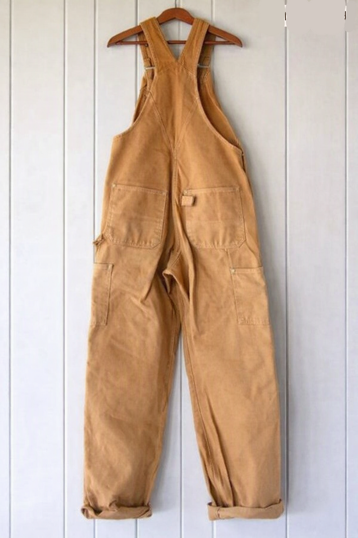 Classic women's vintage bib overalls with a relaxed fit, useful pockets, and adjustable shoulder straps for comfort.