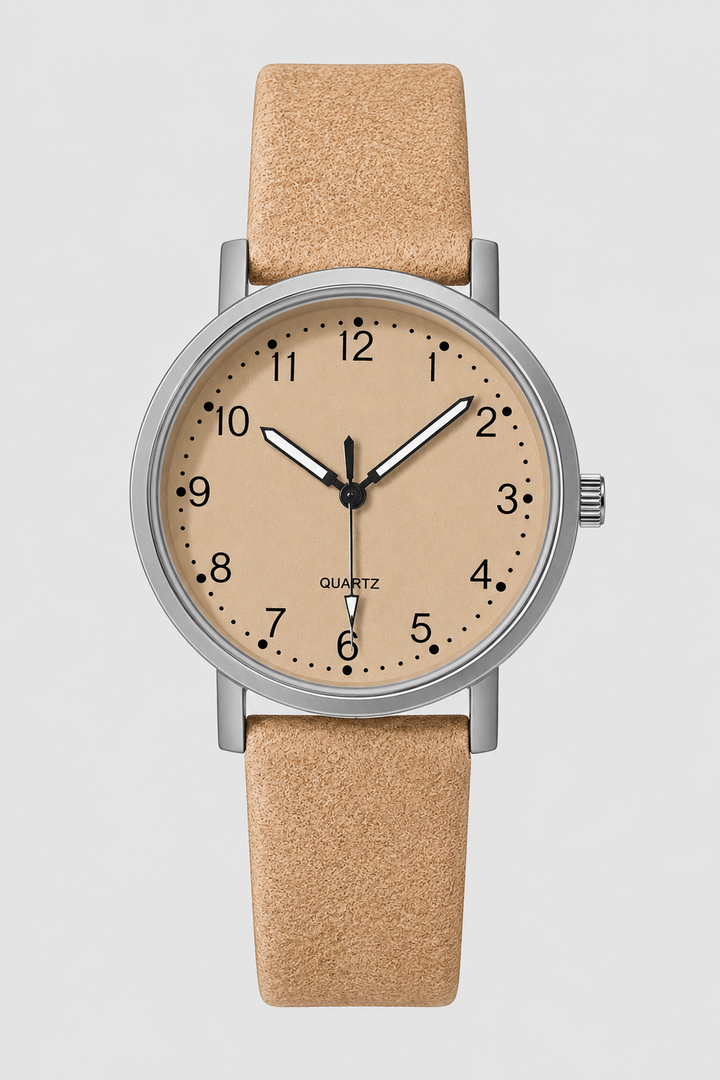 Women's vintage style watch with an elegant round dial & pebbled strap, perfect for daily wear.