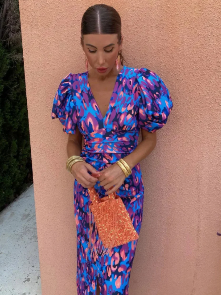 Sophisticated ruched midi dress for women, colorful abstract print suitable for parties & special occasions.