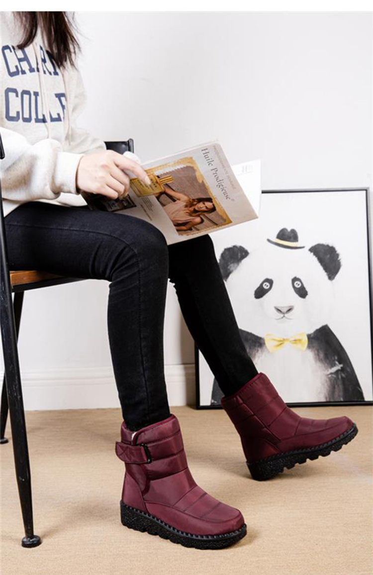 Women's warm waterproof padded winter boots with non-slip sole, perfect for snow & cold weather comfort.
