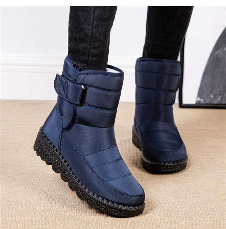 Insulated women's waterproof winter boots with padded comfort, designed for cold weather warmth.