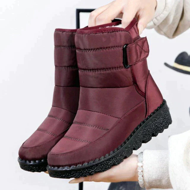 Confidently step in women's waterproof non-slip winter boots, warm & padded for snow and comfort.