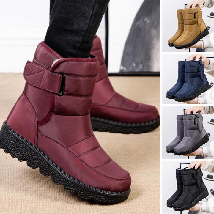 Elegant women's waterproof winter boots with warm padding, ideal for snowy, cold conditions.