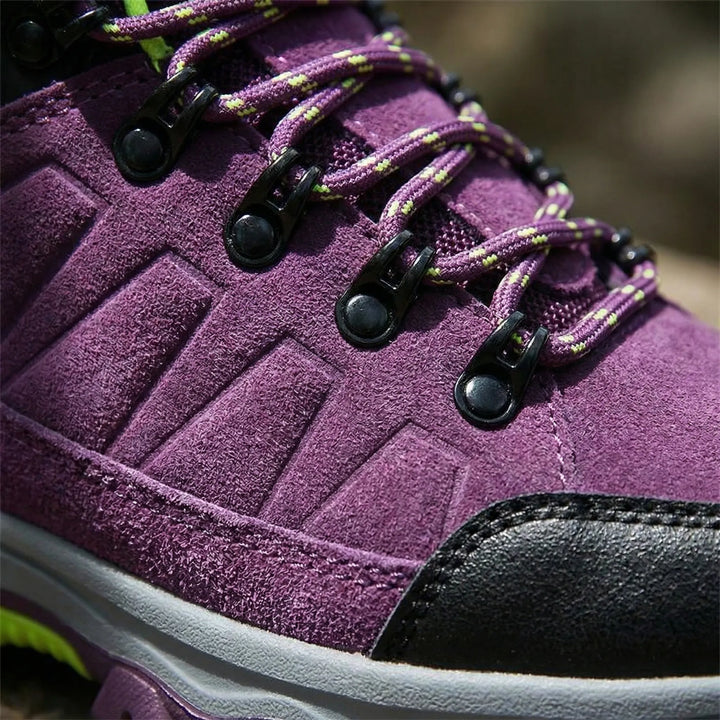 Sharon women's water-repellent hiking boots, offering all-terrain grip & comfort for trails.