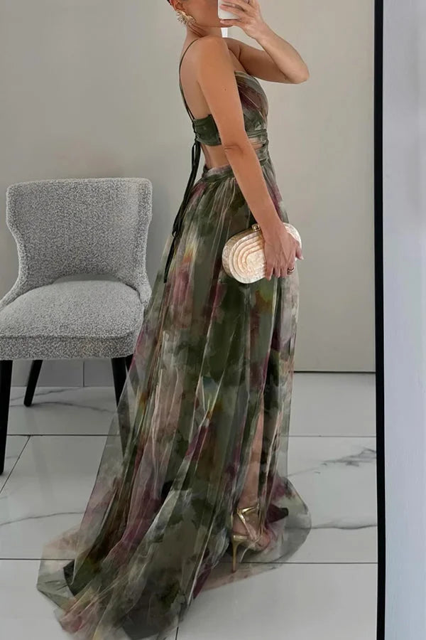 Chic women's elegant maxi dress, watercolor floral pattern, sleeveless design with a stylish twist front.