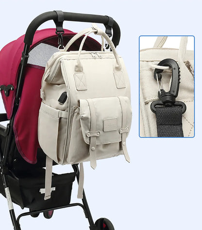 Diaper backpack hanging on a stroller, convenient for baby transport and errands.