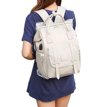 Close-up of the durable nylon fabric on a women's waterproof diaper backpack bag.