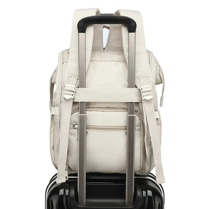 Side profile of a travel diaper bag, showcasing its spacious design for parenting gear.
