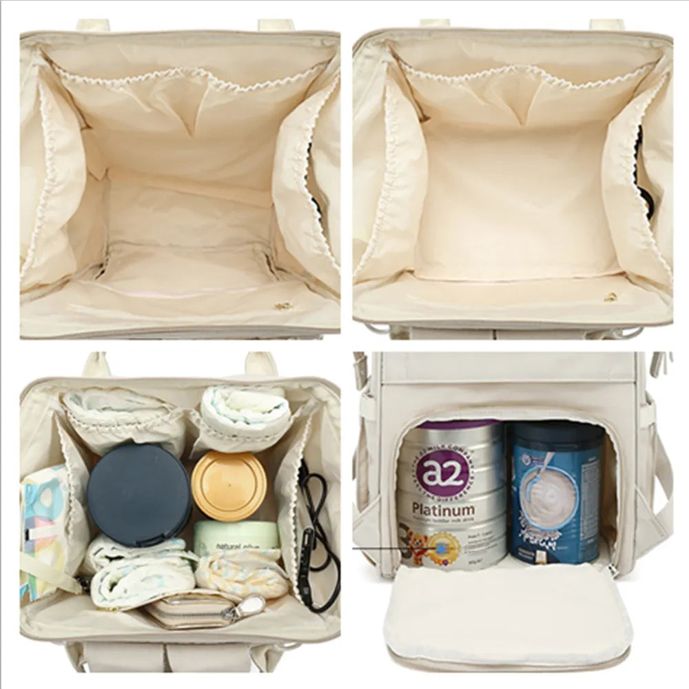 Interior view of the diaper backpack, organized compartments for baby essentials.