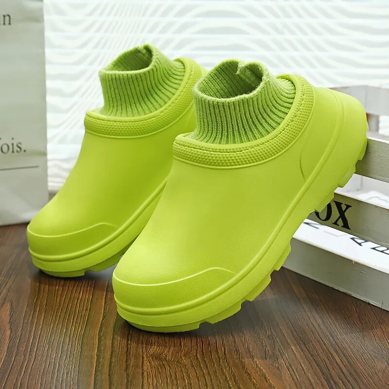 All-weather women's waterproof slip-on clogs with a cozy knit ankle cuff, ideal for casual and outdoor activities.