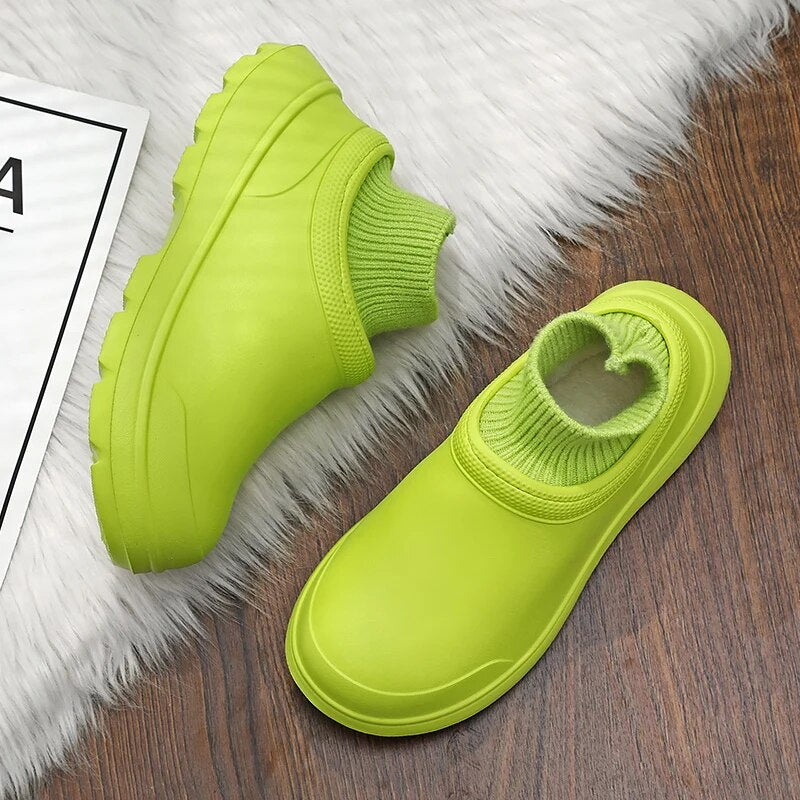 Versatile women's waterproof slip-on clogs with cushioning & a cozy knit ankle cuff for all-day wear.