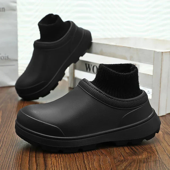Stylish women's slip-on clogs with a waterproof exterior & unique knitted ankle cuff for added warmth.