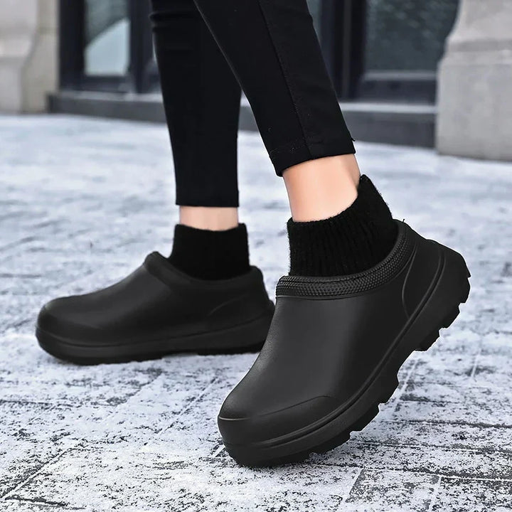 Everyday women's waterproof slip-on clogs with a comfortable cushioned sole & stretchy knit ankle cuff.