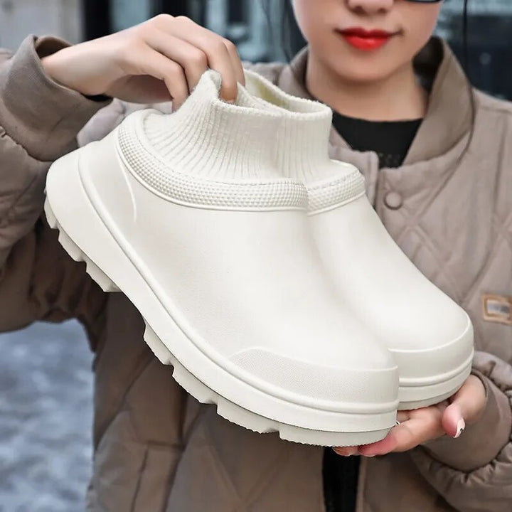Outdoor-ready women's waterproof clogs with a knit ankle cuff, perfect non-slip footwear for versatile use.