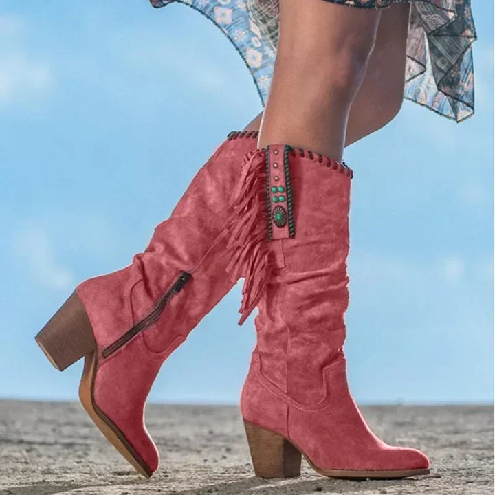 Women's Western mid-calf boots with turquoise fringe & stud details, featuring a stylish block heel.
