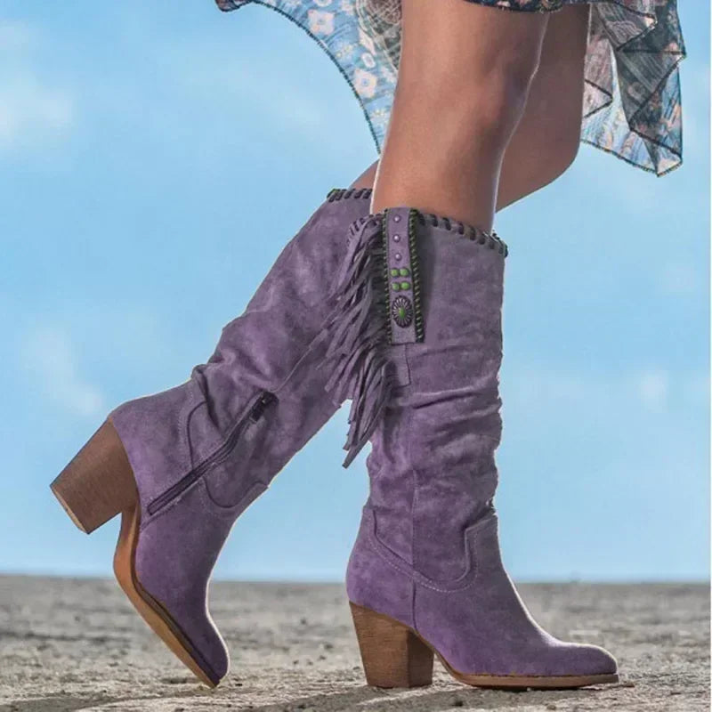 Turquoise women's mid-calf boots, featuring chic fringe, western stud detailing, and a comfortable block heel.
