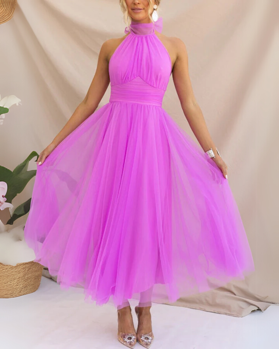 Women's whimsical tulle party dress, perfect for wedding guests. Elegant midi evening gown for special occasions.