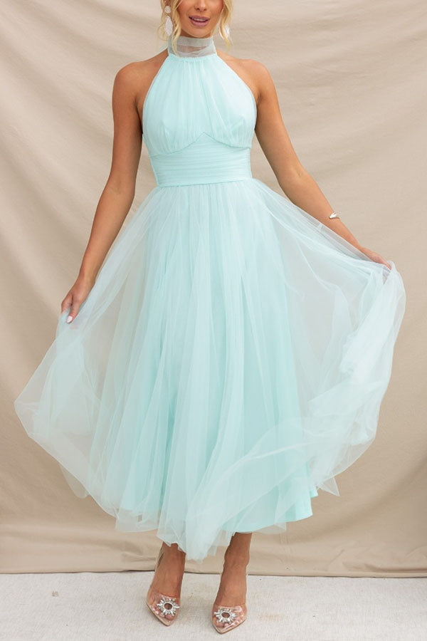 Elegant women's formal tulle dress, a sophisticated wedding guest or evening gown for special occasions.