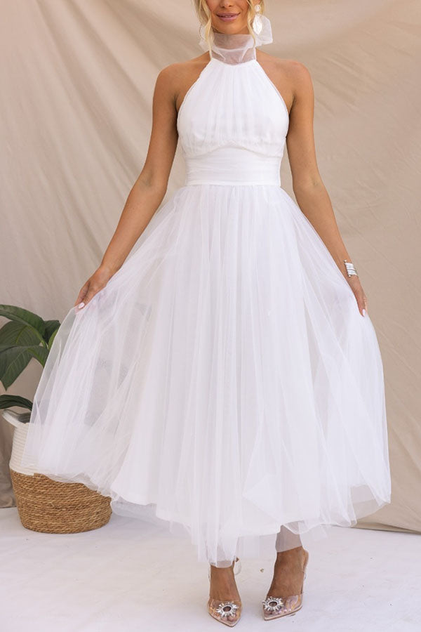 Full length shot of the women's whimsical tulle party dress, a vibrant & elegant wedding guest option.
