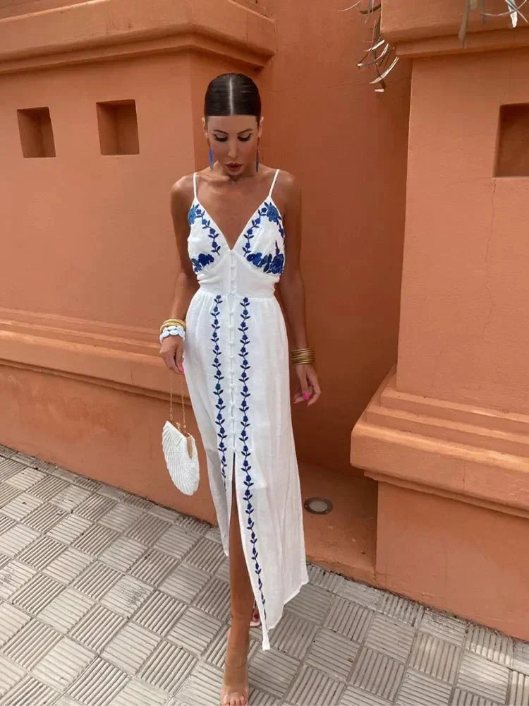 Women's white boho embroidered maxi dress, perfect for wedding guests, summer events & vacations.