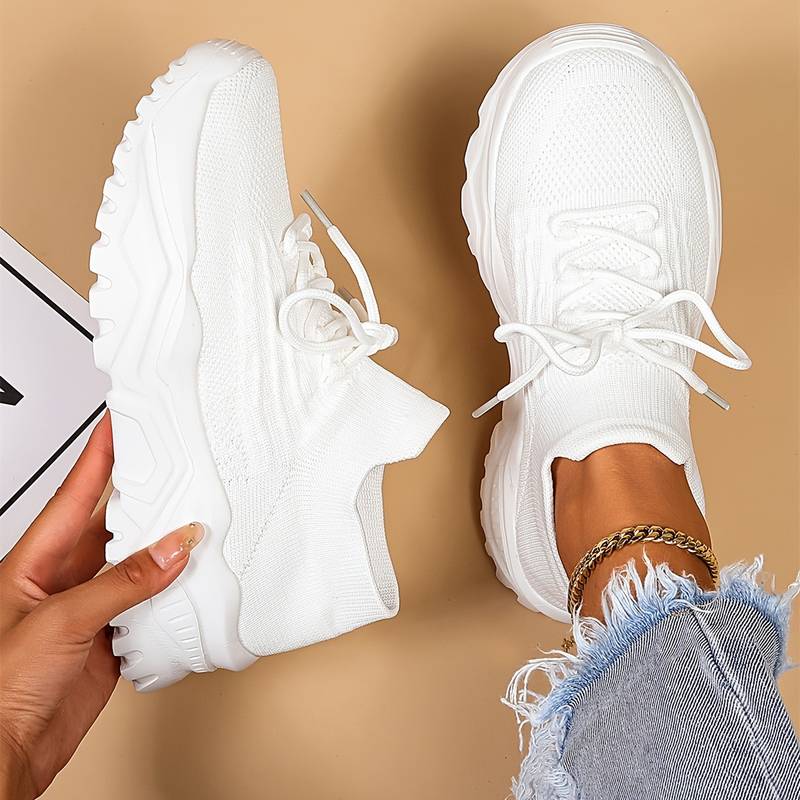 Women's white lace-up chunky sole casual sneakers, perfect for everyday wear & comfortable walking.