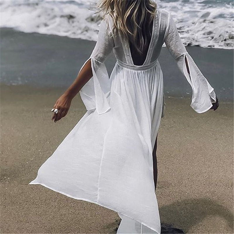 Women's white maxi beach dress with open back & flare sleeves, perfect for summer vacations & resort wear.