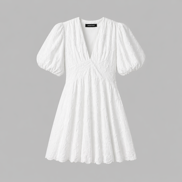 Versatile women's V-neck midi dress in white with textured floral pattern, puff sleeves, ideal for summer elegance.