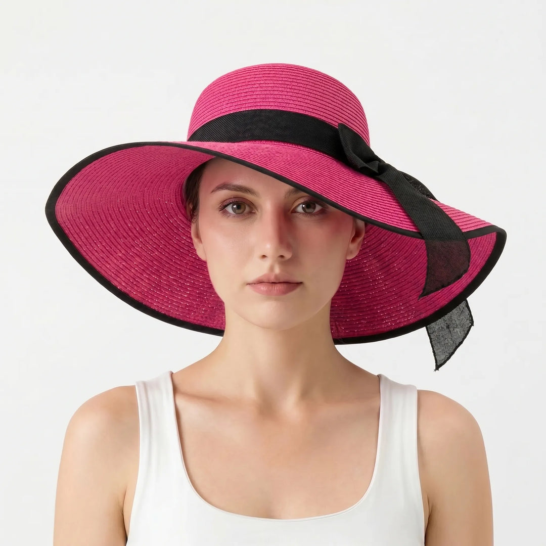 Packable women's wide brim floppy beach hat. A vacation essential for stylish sun shade on summer trips.