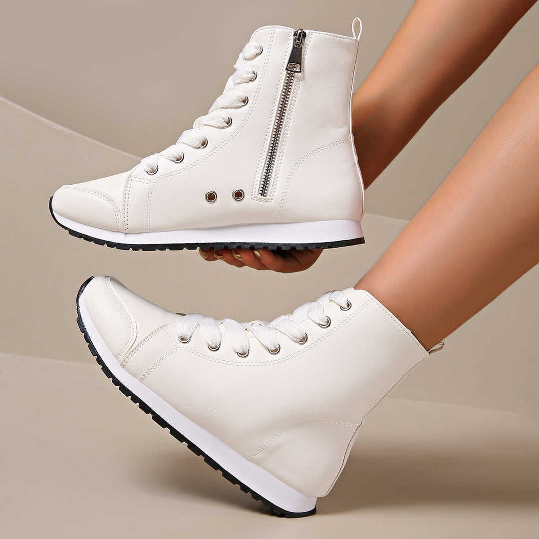 Pair of women's orthopedic wide fit lace-up sneakers, perfect for walking, offering comfort & support.