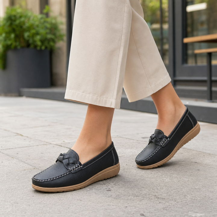 Slip-on women's loafers, wide fit, offering orthopedic arch support & foot pain relief.