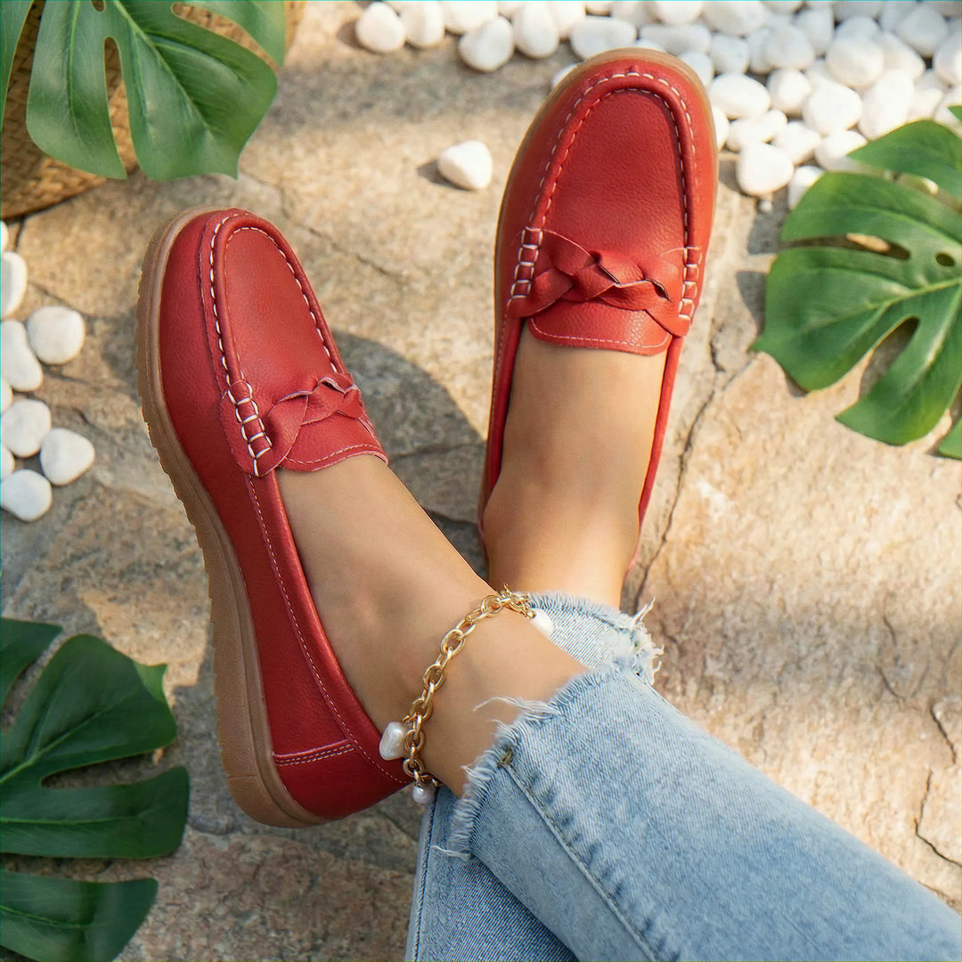 Slip-on wide fit women's loafers with orthopedic arch support for daily comfort.