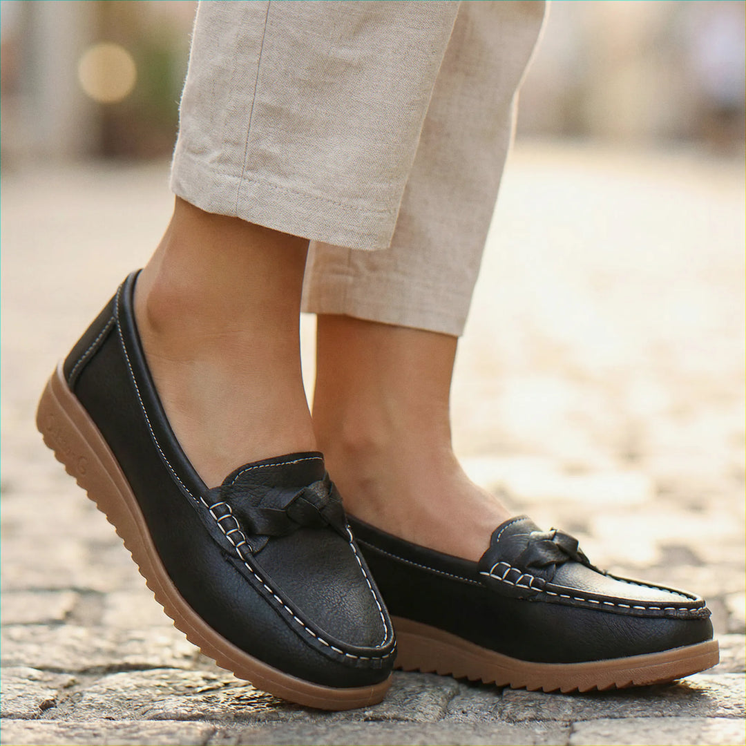 Orthopedic slip-on loafers for women, wide fit, providing excellent arch support.